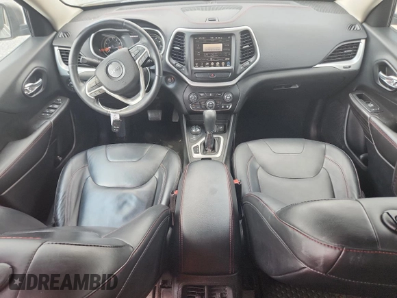2014 Jeep Cherokee Trailhawk с VIN 1C4PJMBS1EW212024, выставлен на аукционе Copart как лот 58825265 с пробегом 99 087 миль миль и Списание • Salvage title. История ставок и продаж доступна на DreamBid. Изображение 8.