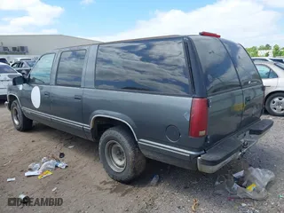 1999 Chevrolet Suburban with VIN 1GNEC16R9XJ502770, listed as a IAAI auction lot 42000467 with 245,844 mi miles. Bid and sale history available at carsss.com. Image 3.