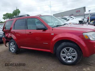 2008 Mercury Mariner z VIN 4M2CU81188KJ49743, wystawiony jako IAAI lot #42402516 z przebiegiem 68 232 mil mil oraz . Historia ofert i sprzedaży dostępna na DreamBid. Obrazek 13.