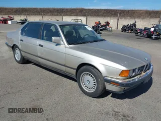 1990 BMW 7 Series with VIN WBAGC4319LDC26553, listed as a IAAI auction lot 42500355 with 344,905 mi miles and . Bid and sale history available at DreamBid. Image 1.