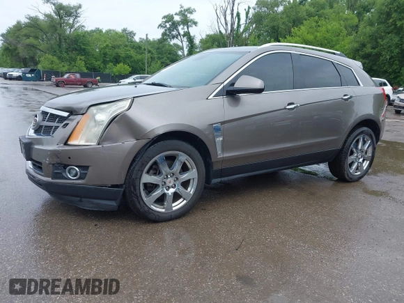 2012 Cadillac SRX Premium Collection z VIN 3GYFNCE3XCS620507, wystawiony jako IAAI lot #42348835 z przebiegiem 184 737 mil mil oraz . Historia ofert i sprzedaży dostępna na DreamBid. Obrazek 17.