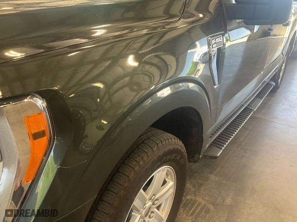 2021 Ford F-150 XL with VIN 1FTEW1CBXMKD42041, listed as a IAAI auction lot 42043742 with 111,018 mi miles. Bid and sale history available at carsss.com. Image 1.