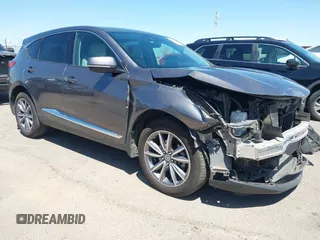 2019 Acura RDX w/Technology Pkg with VIN 5J8TC2H5XKL005340, listed as a IAAI auction lot 42098235 with 61,656 mi miles. Bid and sale history available at carsss.com. Image 1.