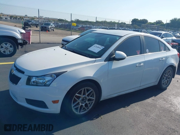 2014 Chevrolet Cruze 2LT z VIN 1G1PE5SB4E7340318, wystawiony jako IAAI lot #42268044 z przebiegiem Nie podano mil oraz . Historia ofert i sprzedaży dostępna na DreamBid. Obrazek 13.