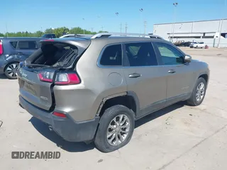2019 Jeep Cherokee Latitude Plus with VIN 1C4PJMLBXKD233749, listed as a IAAI auction lot 41937698 with 103,988 mi miles and . Bid and sale history available at DreamBid. Image 4.