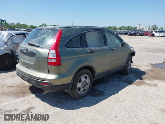2009 Honda CR-V LX with VIN 5J6RE48399L029677, listed as a IAAI auction lot 38701558 with 136,294 mi miles. Bid and sale history available at carsss.com. Image 4.