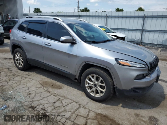 2015 Jeep Cherokee Latitude with VIN 1C4PJMCB6FW644818, listed as a Copart auction lot 62888835 with 262,063 mi miles and Salvage title. Bid and sale history available at DreamBid. Image 4.