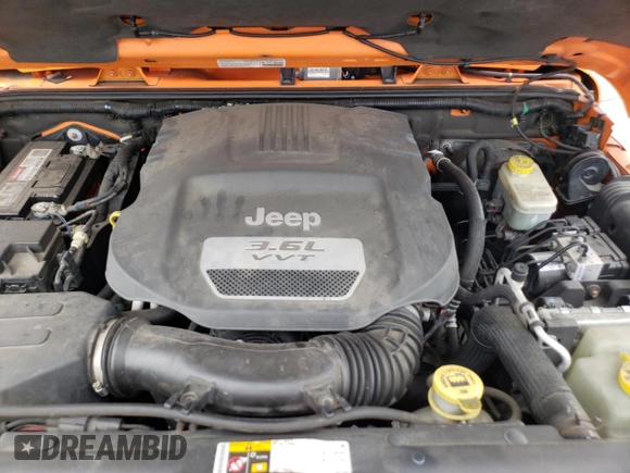 2013 Jeep Wrangler Sahara с VIN 1C4AJWBG4DL557688, выставлен на аукционе Copart как лот 57789095 с пробегом 104 461 миль миль и Списание • Salvage title. История ставок и продаж доступна на DreamBid. Изображение 11.