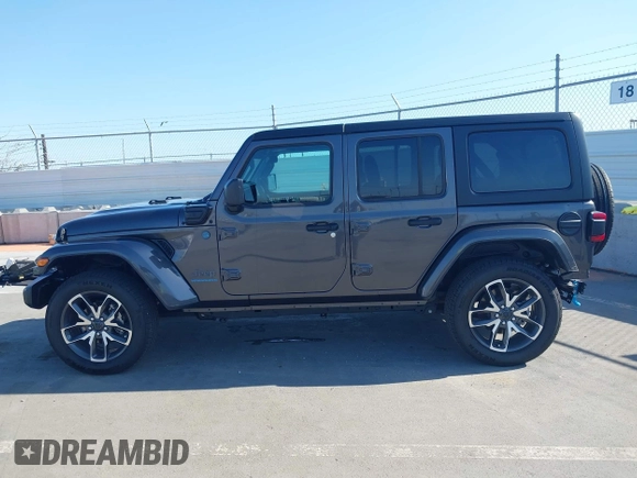 2024 Jeep Wrangler Sport S with VIN 1C4RJXN61RW192386, listed as a IAAI auction lot 42001810 with 7,426 mi miles and . Bid and sale history available at DreamBid. Image 14.