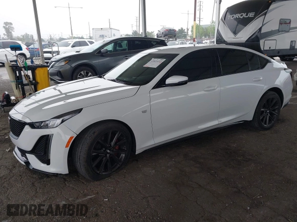 2021 Cadillac CT5 Sport z VIN 1G6DU5RK9M0117981, wystawiony jako IAAI lot #42021432 z przebiegiem 67 363 mil mil oraz . Historia ofert i sprzedaży dostępna na DreamBid. Obrazek 2.