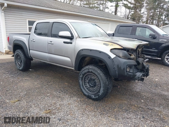 2016 Toyota Tacoma SR with VIN 5TFCZ5AN2GX012937, listed as a IAAI auction lot 41963728 with 157,397 mi miles and . Bid and sale history available at DreamBid. Image 1.