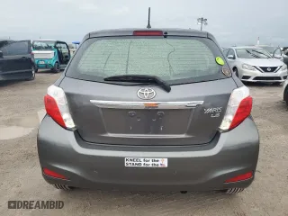 2014 Toyota Yaris L with VIN JTDKTUD32ED587183, listed as a Copart auction lot 75106764 with 0 mi miles and Salvage Title. Bid and sale history available at carsss.com. Image 6.