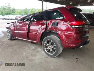 2018 Jeep Grand Cherokee SRT z VIN 1C4RJFDJ0JC231510, wystawiony jako IAAI lot #42445896 z przebiegiem 85 000 mil mil oraz . Historia ofert i sprzedaży dostępna na DreamBid. Obrazek 3.