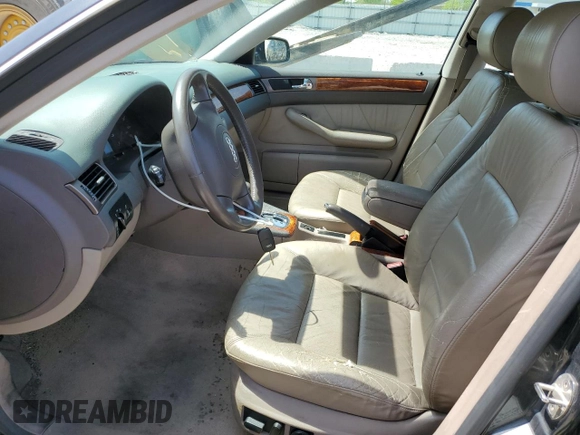 1999 Audi A6 z VIN WAUBA34B6XN119393, wystawiony jako Copart lot #54181235 z przebiegiem 145 925 mil mil oraz Nie do naprawy • Non repairable. Historia ofert i sprzedaży dostępna na DreamBid. Obrazek 7.