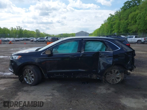 2022 Ford Edge Titanium with VIN 2FMPK4K95NBA45450, listed as a IAAI auction lot 42149752 with Not provided miles and . Bid and sale history available at DreamBid. Image 13.