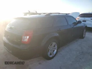 2005 Dodge Magnum RT z VIN 2D8GV58285H550215, wystawiony jako Copart lot #77601924 z przebiegiem 194 701 mil mil oraz Nie do naprawy • Non repairable. Historia ofert i sprzedaży dostępna na DreamBid. Obrazek 3.