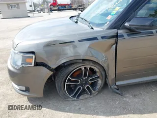 2014 Ford Flex SEL z VIN 2FMGK5C81EBD36460, wystawiony jako IAAI lot #41859985 z przebiegiem 160 572 mil mil oraz . Historia ofert i sprzedaży dostępna na DreamBid. Obrazek 17.