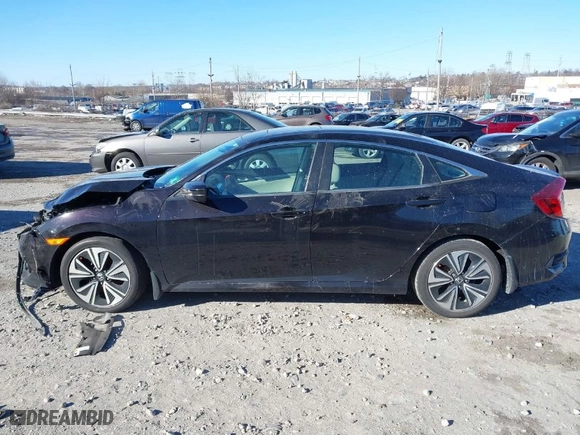 2016 Honda Civic Sedan EX-T with VIN 19XFC1F32GE206768, listed as a IAAI auction lot 41270610 with 35,827 mi miles. Bid and sale history available at carsss.com. Image 13.