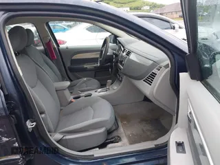 2007 Chrysler Sebring Touring z VIN 1C3LC56K37N644894, wystawiony jako IAAI lot #42326982 z przebiegiem 206 073 mil mil oraz . Historia ofert i sprzedaży dostępna na DreamBid. Obrazek 5.