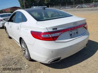 2013 Hyundai Azera with VIN KMHFH4JG9DA330074, listed as a IAAI auction lot 41975579 with 1 mi miles. Bid and sale history available at carsss.com. Image 3.
