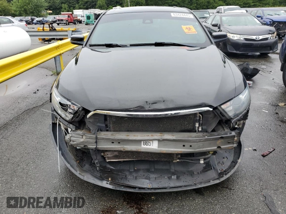 2013 Ford Taurus SHO with VIN 1FAHP2KT6DG211496, listed as a Copart auction lot 63424445 with 123,742 mi miles and Salvage title. Bid and sale history available at DreamBid. Image 5.