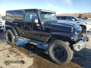 2016 Jeep Wrangler Unlimited 75th Anniversary with VIN 1C4BJWEG7GL113824, listed as a Copart auction lot 81372864 with 98,497 mi miles and Salvage title. Bid and sale history available at DreamBid. Image 4.