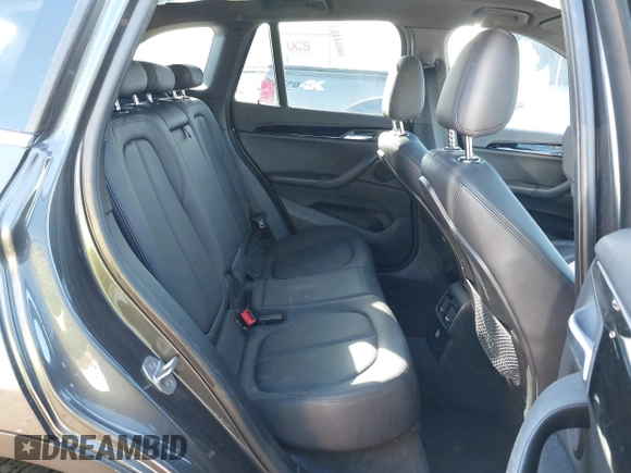 2017 BMW X1 sDrive28i with VIN WBXHU7C30H5H32753, listed as a IAAI auction lot 41441791 with 100,072 mi miles. Bid and sale history available at carsss.com. Image 8.