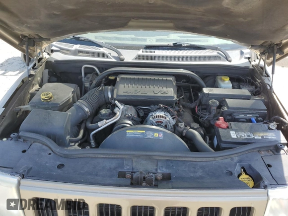 2006 Jeep Commander with VIN 1J8HG48N06C274675, listed as a Copart auction lot 54521835 with 134,587 mi miles and Salvage Title. Bid and sale history available at DreamBid. Image 12.