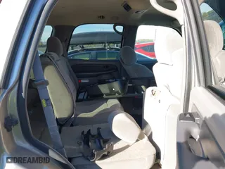 2003 Chevrolet Tahoe LS with VIN 1GNEC13V13J163837, listed as a IAAI auction lot 41641915 with 102,312 mi miles. Bid and sale history available at carsss.com. Image 8.