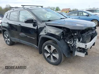 2020 Jeep Compass Latitude with VIN 3C4NJDBBXLT256632, listed as a IAAI auction lot 42155530 with 71,888 mi miles and . Bid and sale history available at DreamBid. Image 1.