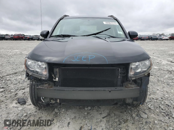 2016 Jeep Compass Latitude with VIN 1C4NJDEB4GD808780, listed as a Copart auction lot 49967215 with 81,683 mi miles and Salvage Title. Bid and sale history available at DreamBid. Image 5.