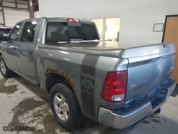 2010 Dodge Ram 1500 SLT with VIN 1D7RV1CT0AS200098, listed as a IAAI auction lot 41813191 with 186,674 mi miles. Bid and sale history available at carsss.com. Image 3.
