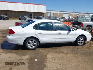 2002 Ford Taurus SE Standard with VIN 1FAFP53U42A173413, listed as a IAAI auction lot 42023834 with 159,744 mi miles and . Bid and sale history available at DreamBid. Image 13.