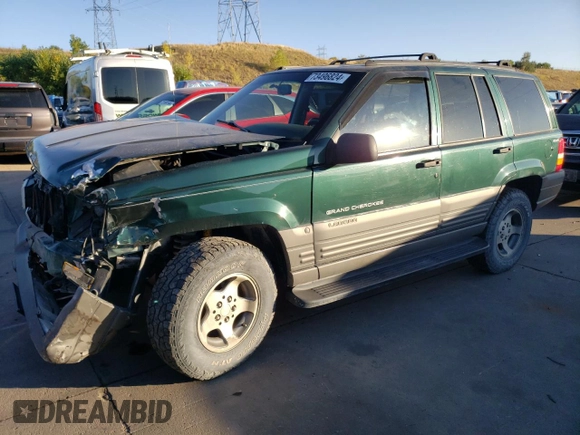 1997 Jeep Grand Cherokee Laredo with VIN 1J4GZ58Y6VC647434, listed as a Copart auction lot 73496824 with 124,946 mi miles and Salvage Title. Bid and sale history available at carsss.com. Image 1.