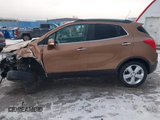 2016 Buick Encore Leather with VIN KL4CJCSB0GB571295, listed as a IAAI auction lot 41121647 with 30,936 mi miles. Bid and sale history available at carsss.com. Image 14.
