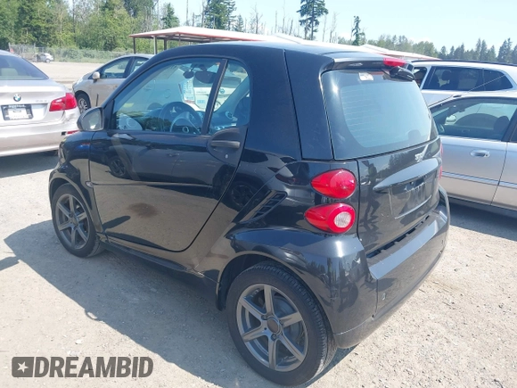 2012 Smart fortwo Pure z VIN WMEEJ3BAXCK526477, wystawiony jako IAAI lot #42392611 z przebiegiem 143 378 mil mil oraz . Historia ofert i sprzedaży dostępna na DreamBid. Obrazek 3.