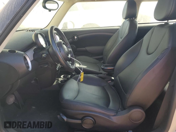 2013 MINI Hardtop with VIN WMWSU3C56DT688738, listed as a Copart auction lot 76593004 with 107,253 mi miles and Clean Title. Bid and sale history available at DreamBid. Image 7.