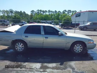 2004 Mercury Grand Marquis LS Premium z VIN 2MEHM75W64X681851, wystawiony jako IAAI lot #42389437 z przebiegiem 118 153 mil mil oraz . Historia ofert i sprzedaży dostępna na DreamBid. Obrazek 13.