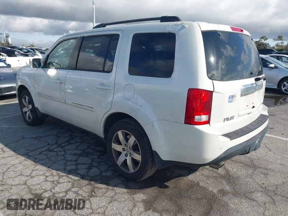 2015 Honda Pilot Touring with VIN 5FNYF3H93FB007766, listed as a IAAI auction lot 41932052 with 131,036 mi miles. Bid and sale history available at carsss.com. Image 3.