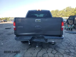 2004 Ford F-150 XLT with VIN 1FTRX12514KD37885, listed as a Copart auction lot 73998724 with 164,189 mi miles and Salvage Title. Bid and sale history available at carsss.com. Image 6.
