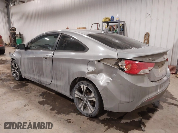 2013 Hyundai Elantra Coupe GS PZEV with VIN KMHDH6AE6DU000893, listed as a IAAI auction lot 41613994 with 94,388 mi miles. Bid and sale history available at carsss.com. Image 3.