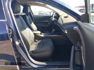 2021 Mazda CX-30 Premium with VIN 3MVDMBDYXMM307047, listed as a IAAI auction lot 41974966 with 53,409 mi miles and . Bid and sale history available at carsss.com. Image 5.