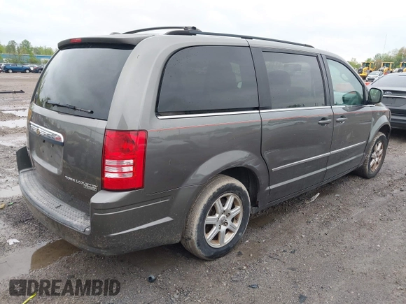 2010 Chrysler Town & Country Touring with VIN 2A4RR5D18AR386942, listed as a IAAI auction lot 42199851 with 143,924 mi miles and . Bid and sale history available at DreamBid. Image 4.