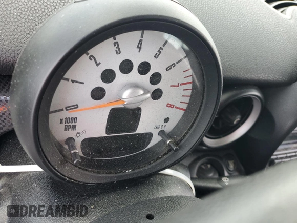 2011 MINI Hardtop S with VIN WMWSV3C55BTY20530, listed as a Copart auction lot 56016985 with Not Provided miles and Salvage Title. Bid and sale history available at DreamBid. Image 9.