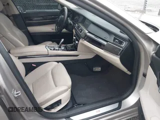 2012 BMW 7 Series 750i with VIN WBAKA8C50CDX01319, listed as a IAAI auction lot 42133359 with 168,986 mi miles and . Bid and sale history available at DreamBid. Image 5.