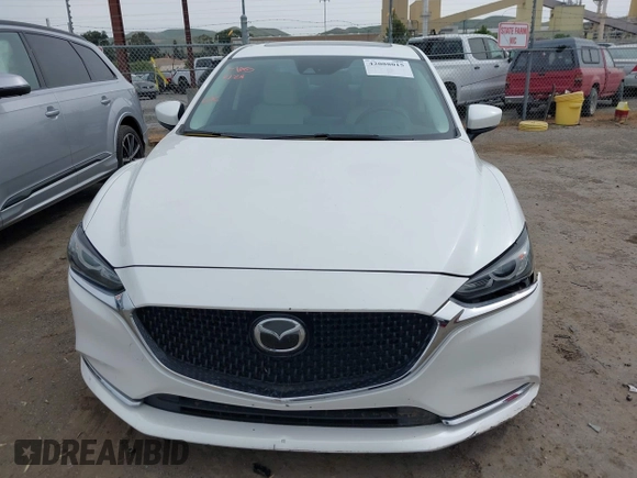 2018 Mazda 6 Grand Touring Reserve with VIN JM1GL1WYXJ1300116, listed as a IAAI auction lot 42088015 with 57,760 mi miles and . Bid and sale history available at DreamBid. Image 12.