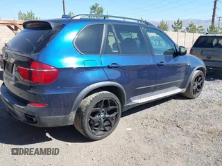 2012 BMW X5 50i with VIN 5UXZV8C57CL423223, listed as a IAAI auction lot 42606594 with 94,695 mi miles and . Bid and sale history available at DreamBid. Image 4.