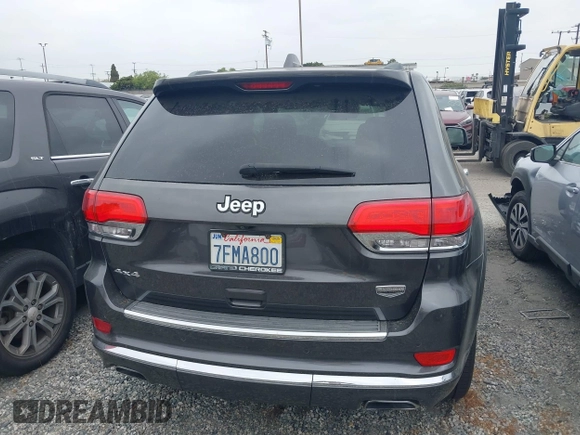 2014 Jeep Grand Cherokee Summit with VIN 1C4RJFJG8EC434899, listed as a IAAI auction lot 42399912 with 186,840 mi miles and . Bid and sale history available at DreamBid. Image 17.