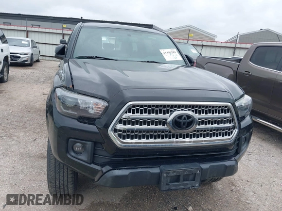 2017 Toyota Tacoma SR5 with VIN 5TFAZ5CN8HX052459, listed as a IAAI auction lot 41495281 with 212,314 mi miles and . Bid and sale history available at DreamBid. Image 12.