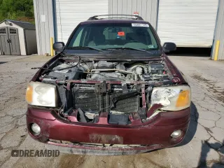 2003 GMC Envoy SLT z VIN 1GKET16S136186780, wystawiony jako Copart lot #55927155 z przebiegiem 163 099 mil mil oraz Szkoda całkowita • Salvage title. Historia ofert i sprzedaży dostępna na DreamBid. Obrazek 5.